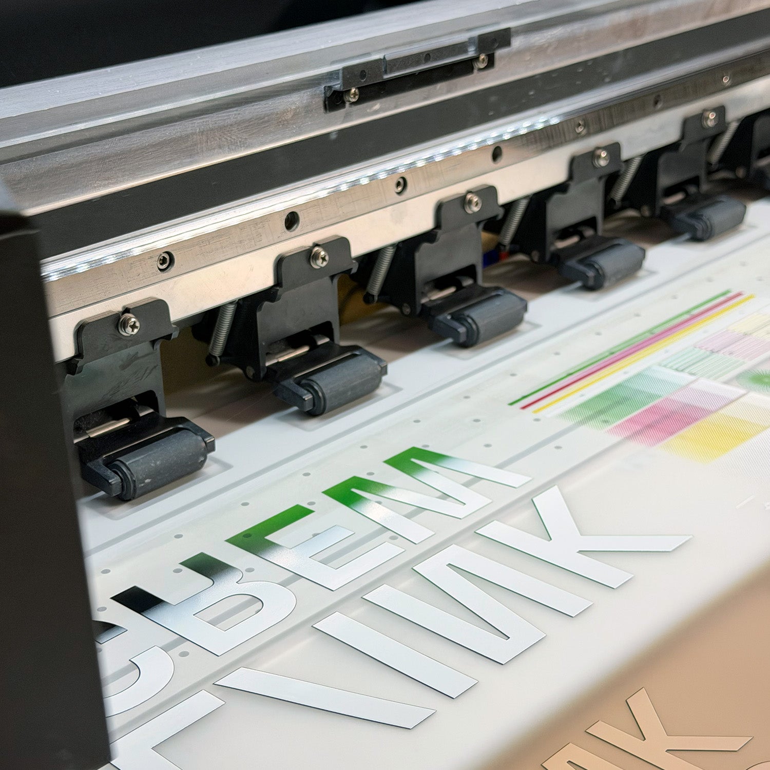 DTF transfer film printed at Labo Ink with vivid logo designs ready for curing